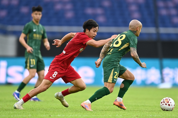 李镇全停赛引发争议 中足联处罚程序引热议